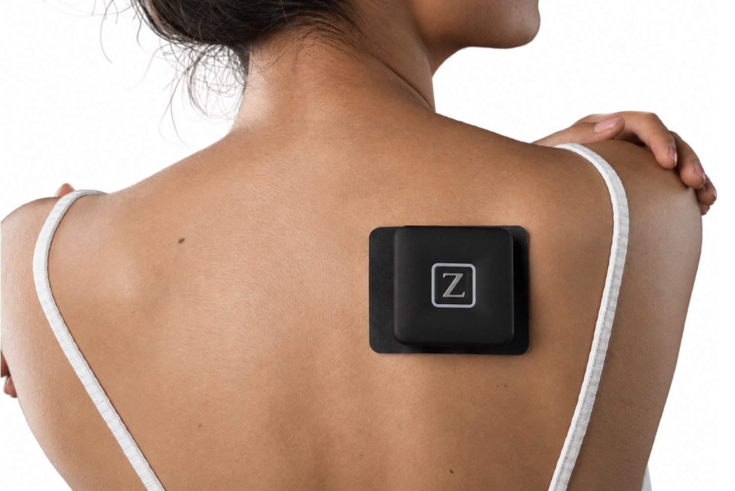 Pod on a pad over the shoulder blade
