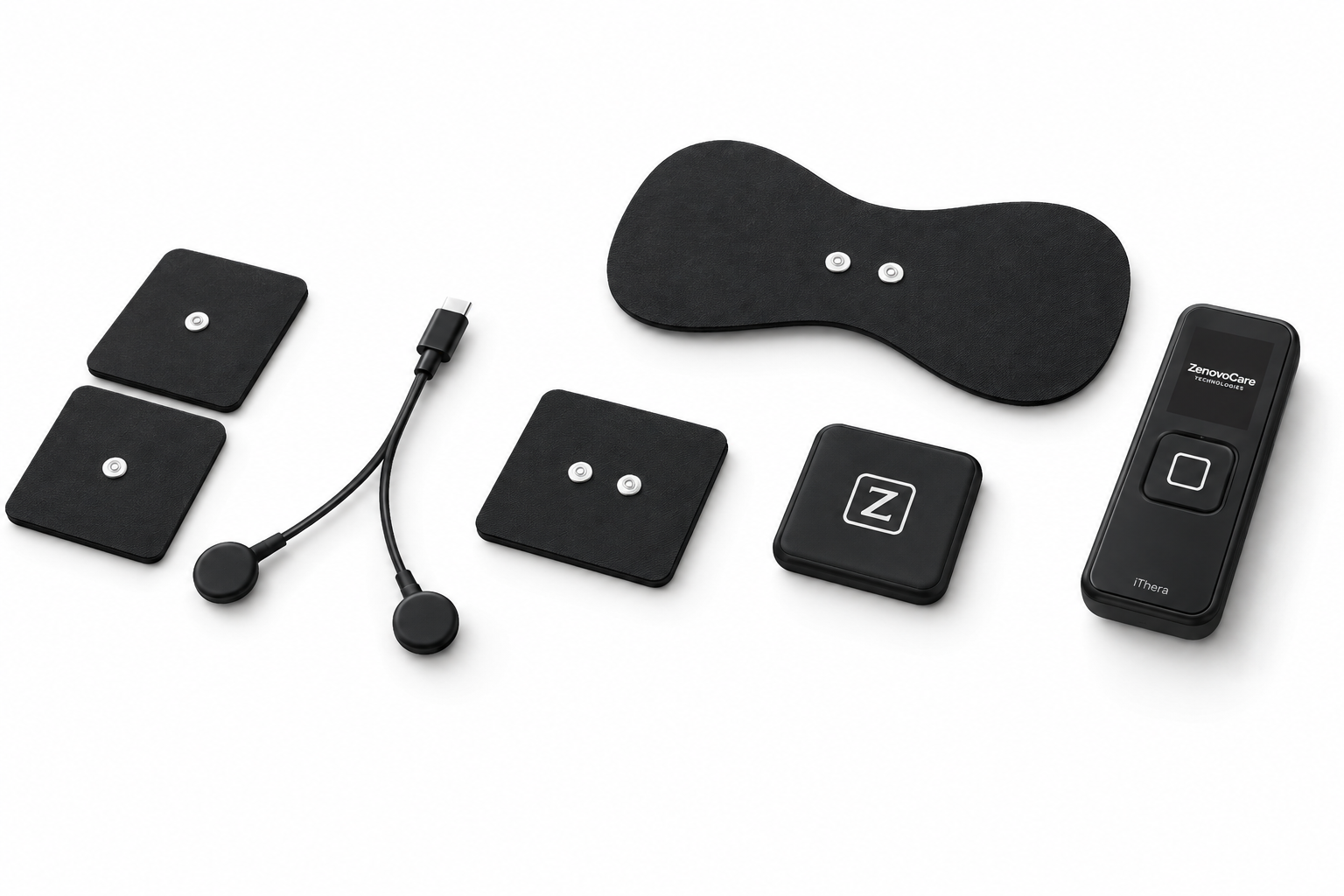 Everything in the box: spot pads, cable, trigger point pad, large muscle pad, pod and remote